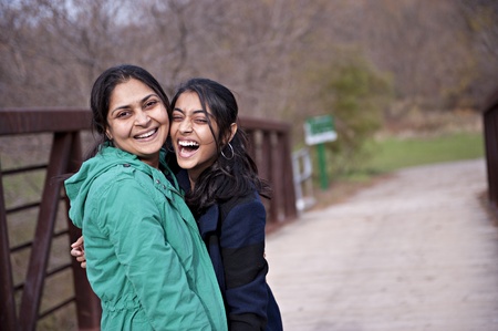 Indian loving mother and daughter in outdoorsの写真素材