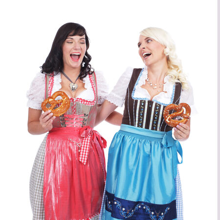 Two women with bretzelsの写真素材