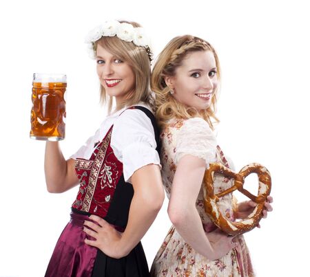 Two woman with dirndl  isolatedの写真素材