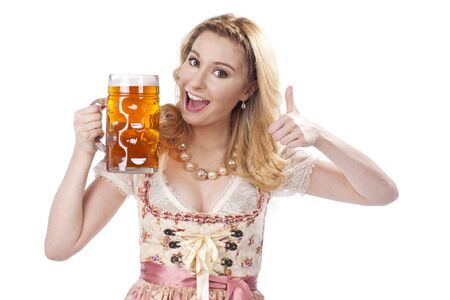 Bavarian woman with beer in traditional costume isolatedの写真素材