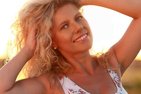 Happy mature Woman in nature outdoor