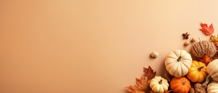 Festive autumn decor from pumpkins, berries and leaves on a white wooden background. Concept of Thanksgiving day or Halloween.の素材