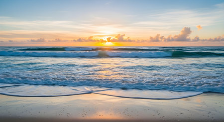 Capture the serenity of dawn with this beautiful beach scene. Golden sunlight, gentle waves, and a peaceful atmosphere offer a tranquil escape for your next project.の素材