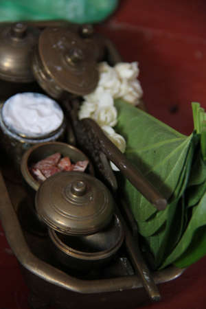 A Tepak Sireh is a traditional Malay metal container for storing betel leaves used for chewing.の写真素材