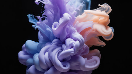 A dramatic explosion of vibrant purple and peach colored ink creates swirling, cloud-like forms in liquid against a stark black background. The ink diffuses and disperses, forming intricate organic shapes with delicate tendrils and dense masses. The contrast between the bright colors and the dark background emphasizes the dynamic motion and texture of the fluid.の素材