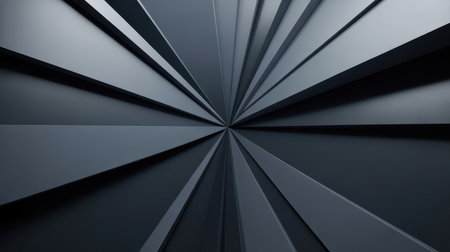 A dark, abstract background featuring a geometric radial burst pattern. Sharp, angular lines converge towards a central point, creating a sense of depth and motion. The shades of gray and black, along with subtle lighting and shadow, give the design a sophisticated and futuristic feel.の素材