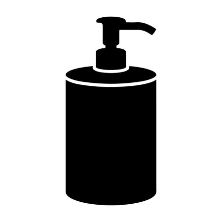A black silhouette of a liquid soap dispenser bottle with a pump mechanism. The bottle has a cylindrical body and a curved spout.のイラスト素材