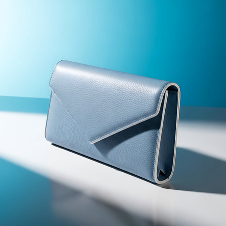 Blue leather clutch on a blue background. 3d render illustration.の素材