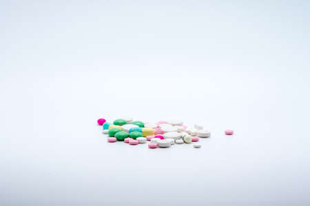 Multiple color drug and pills isolated on white background.の写真素材