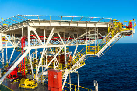 Helicopter landing deck on offshore jack up drilling rig with beautiful sae view.の写真素材