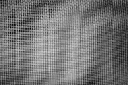 Texture of wire screen for use as a background.の写真素材