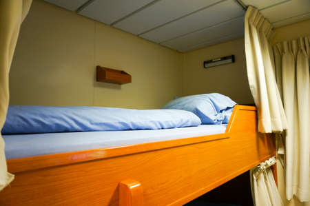 Living room on offshore jackup drillin rig with two bed.