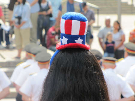 a wowan wearing a small hat at the 4th of July, Boston, 2011のeditorial素材