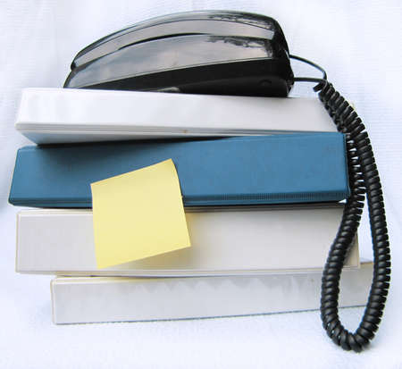 phone above four office folders