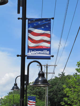 welcome to Collinsville signs on street lampsの写真素材