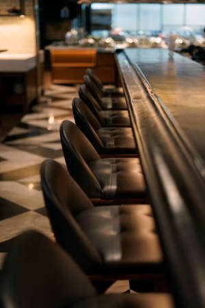 Bar stool chair in empty restaurant.