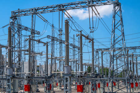 Image of high voltage transformer station against the blue sky.の写真素材