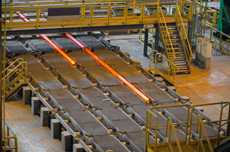 Photograph shows the process of making steel billets for pipes.の写真素材