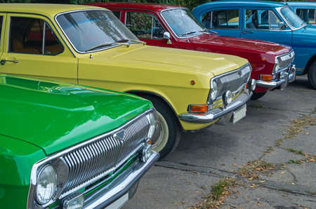 Vintage vehicles are in the parking lot on the city show.の写真素材