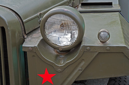 Headlights of an retro military vehicle during World War II.のeditorial素材