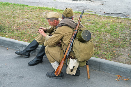 Dnepropetrovsk, Ukraine - September 14, 2013: Group of unidentified re-enactors dressed as Soviet...