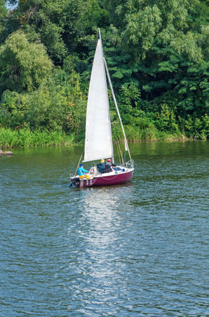 Dnepropetrovsk, Ukraine - September 14, 2013: Pleasure yacht floating on water in the river on a...