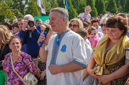 Dnepropetrovsk, Ukraine - September 13, 2014: Dnepropetrovsk Mayor Ivan Kulichenko congratulates residents on the occasion of City Dayのeditorial素材