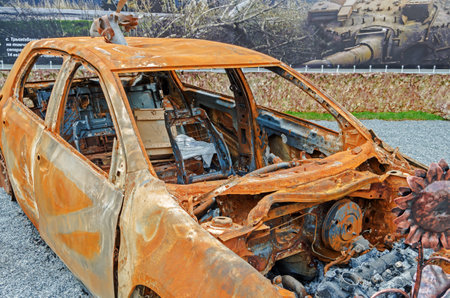 Dnipro, Ukraine - May 19, 2016: Open air museum dedicated to war in the Donbass. Burned car as a result of war in the Donbassのeditorial素材