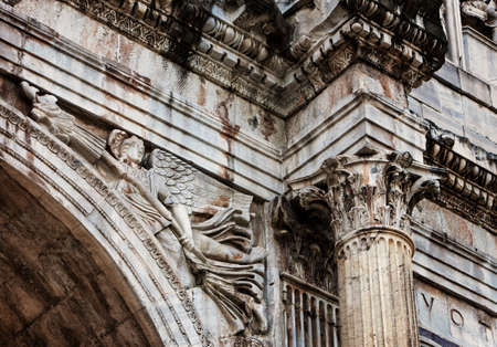 Detail of the column and relief in the arch of Constantine in Rome, Italyの写真素材