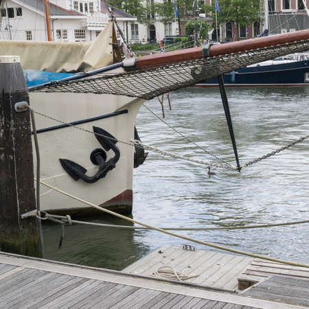 Old vintage boats in the harbor of Rotterdam in springの写真素材