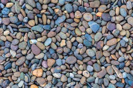 Sea stones background blue violetの写真素材
