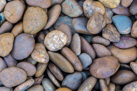 Sea stones background blue violetの写真素材