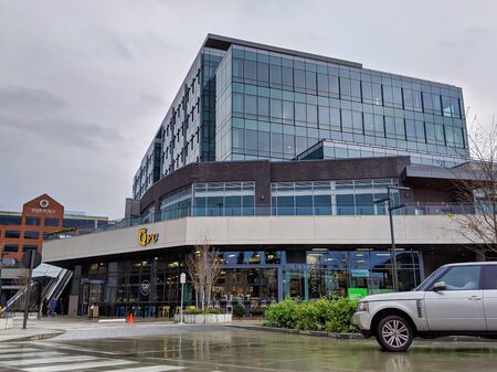 Kirkland, WA / USA - circa December 2019: Exterior view of the brand new QFC grocery store in the Kirkland Urban Plaza downtown.のeditorial素材