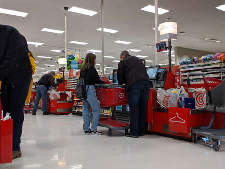Woodinville, WA / USA - circa February 2020: Customers checking out inside a Target store.
