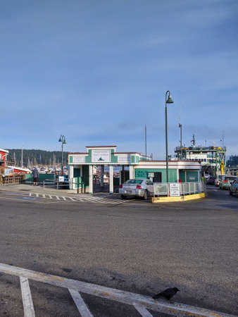 San Juan Island, WA / USA - circa November 2019: Travelling people hanging around the Washington State Ferry station at Friday Harbor docks.のeditorial素材
