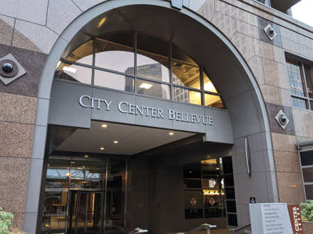 Bellevue, WA / USA - circa December 2019: Exterior view of the Bellevue City Center building with no people around on a bright sunny day. Bellevue, WA / USA - circa December 2019: Exterior view of the Bellevue City Center building with no people around on a bright sunny day.