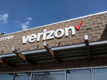 Woodinville, WA / USA - circa April 2020: Low angle view of the Verizon Wireless storefront on a bright, sunny day.のeditorial素材