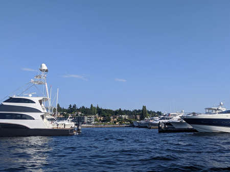 Kirkland WA USA - circa July 2020: Boats docked on Lake Washington on a bright, sunny day.のeditorial素材