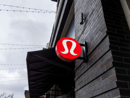 Kirkland, WA USA - circa March 2021: Low angle view of the exterior of a Lululemon althetic clothing shop in the Totem Lake shopping district.のeditorial素材