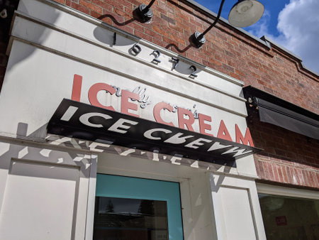 Redmond, WA USA - circa March 2021: Low angle view of a Molly Moon's Ice Cream parlor in downtown Redmond.のeditorial素材