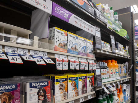 Kirkland, WA USA - circa April 2021: View of shelves stocked with flea and tick treatments for cats...