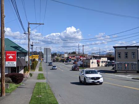 Snohomish, WA USA - circa April 2021: Street view of historic downtown Snohomish's main street, with...