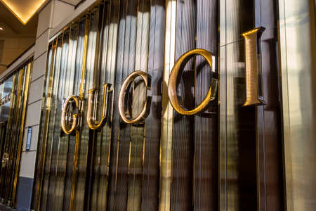 Bellevue, WA USA - circa May 2021: View of a Gucci storefront in the downtown district on a sunny day.のeditorial素材