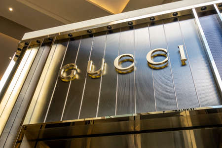 Bellevue, WA USA - circa May 2021: View of a Gucci storefront in the downtown district on a sunny day.のeditorial素材