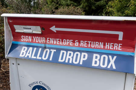 Tacoma, WA USA - circa August 2021: Close up of a Ballot Drop Box outside of a police station in...