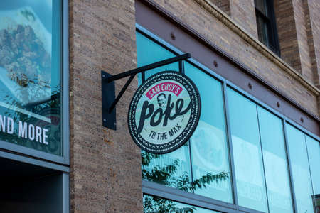 Tacoma, WA USA - circa August 2021: Street view of a Sam Choy's Poke to the Max restaurant in the downtown Tacoma area.のeditorial素材