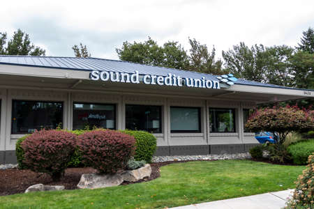 Redmond, WA USA - circa August 2021: Street view of the entrance to Sound Credit Union on an overcast day.のeditorial素材