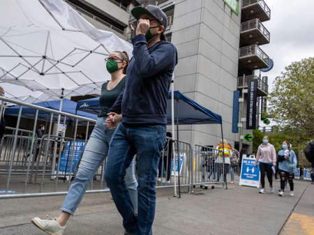 Seattle, WA USA - circa May 2021: View of separated lines for people to queue up for health screenings before getting the covid 19 vaccine.のeditorial素材