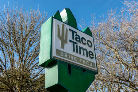 Woodinville, WA USA - circa February 2022: Street view of a Taco Time fast food restaurant on a bright, sunny day downtown.のeditorial素材