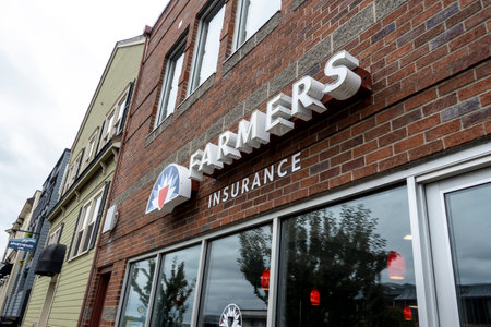 Tacoma, WA USA - circa August 2021: Low angle view of a Farmers Insurance building in the historic...